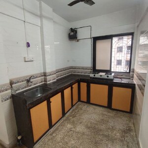 Kitchen in 1 BHK Apartment at Chincholi Apartment, Malad West – for Rent