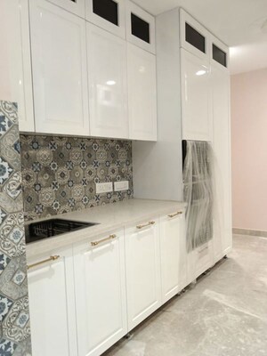 Kitchen in 4 BHK Builder Floor at Sushant Lok I – for Sale