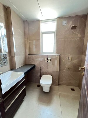 Bathroom in 3 BHK Apartment at Smart World Orchard, Sector 61 – for Sale