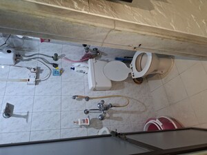 Bathroom in 2 BHK Apartment at Vile Parle West – for Sale