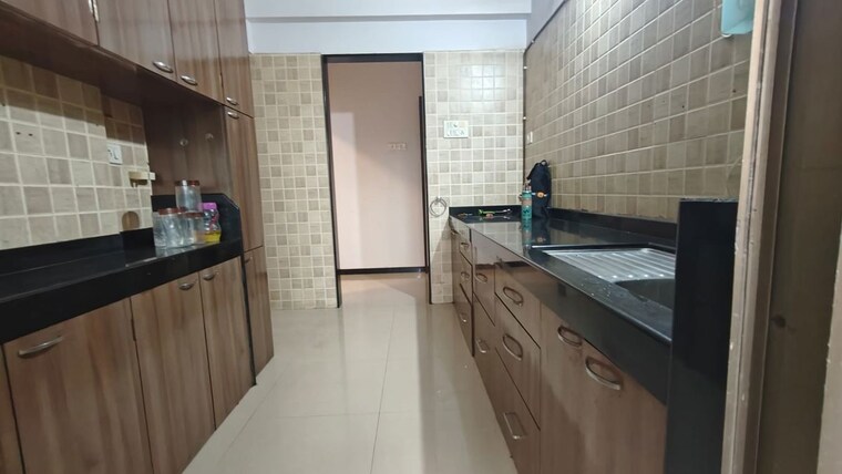Kitchen, atul-blue-mountains 2 Bedroom 800 Sq.Ft. Apartment In Malad East Mumbai 10625697