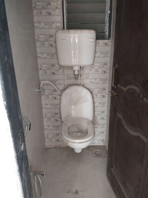 Bathroom in 2 BHK Apartment at Jayshakti Panchmukhi CHS, Karanjade – for Rent