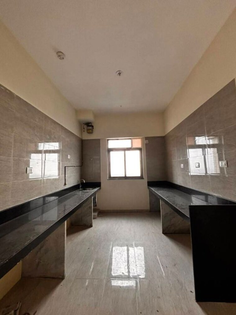 Kitchen, sheth-auris-serenity-tower-3 3.5 Bedroom 1360 Sq.Ft. Apartment In Malad West Mumbai 10625742