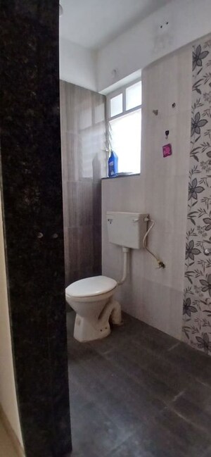 Bathroom in 1 BHK Apartment at HPC Sai Crown Imperial, Thergaon – for Sale