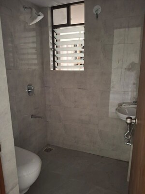 Bathroom in 2 BHK Apartment at Siddha Sky, Sion – for Rent