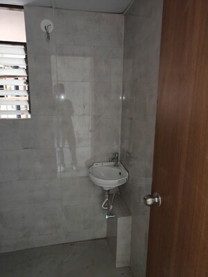 Bathroom in 2 BHK Apartment at Siddha Sky, Sion – for Rent