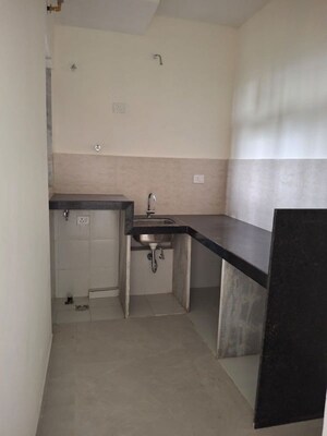 Kitchen in 2 BHK Apartment at Siddha Sky, Sion – for Rent