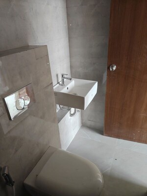 Bathroom in 2 BHK Apartment at Siddha Sky, Sion – for Rent