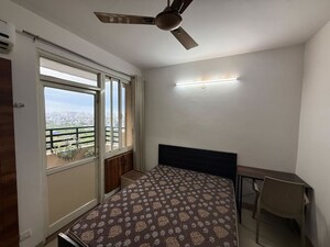 Bedroom in 2 BHK Apartment at Amrapali Kingswood, Sector 4 Greater Noida – for Rent