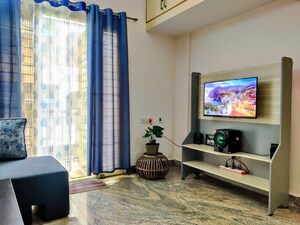 Living Room in 1 BHK Apartment at Infants Monarch, Halasuru – for Rent