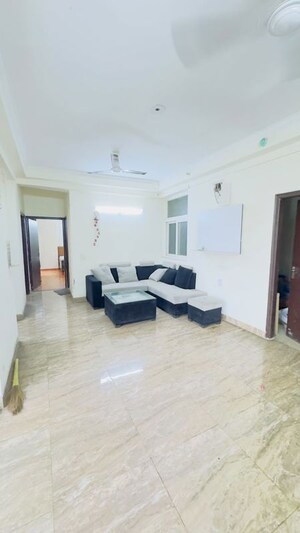 Living Room in 3.5 BHK Apartment at Aims Golf City, Sector 75 – for Sale