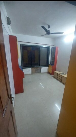 Room in 2 BHK Apartment at Riddhi Garden, Malad East – for Rent