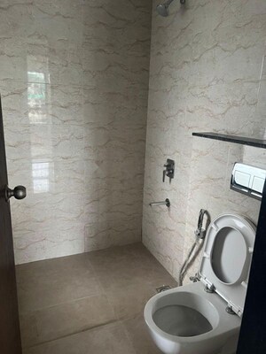 Bathroom in 2 BHK Apartment at Shapoorji Pallonji Joyville Hinjewadi, Hinjewadi – for Rent