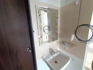 Bathroom in 2 BHK Apartment at Shapoorji Pallonji Joyville Hinjewadi, Hinjewadi – for Rent