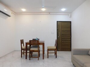 Room in 2 BHK Apartment at Ruparel Ariana, Parel – for Rent