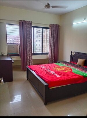 Bedroom in 1 BHK Apartment at Satellite Garden, Goregaon East – for Rent