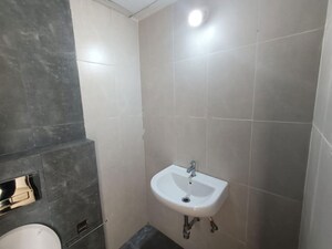 Bathroom in 2 BHK Apartment at Shapoorji Pallonji Joyville Hinjewadi, Hinjewadi – for Rent