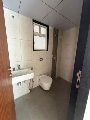 Bathroom in 1 BHK Apartment at Kohinoor Sportsville, Hinjewadi – for Rent