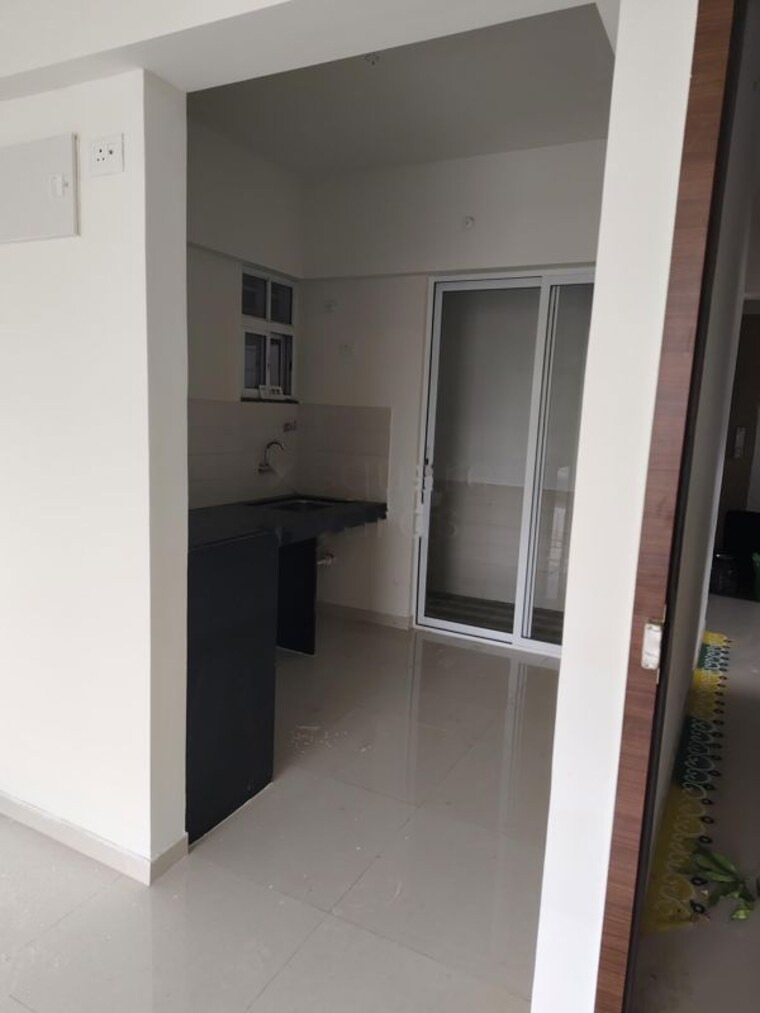 Kitchen, saheel-itrend-homes 2 Bedroom 975 Sq.Ft. Apartment In Hinjewadi Pune 10626053