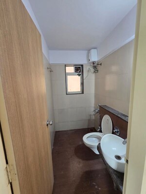 Bathroom in 3 BHK Apartment at DB Parkwoods, Kasarvadavali – for Rent