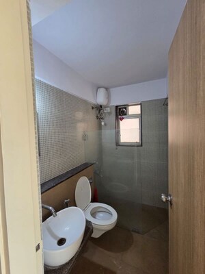 Bathroom in 3 BHK Apartment at DB Parkwoods, Kasarvadavali – for Rent