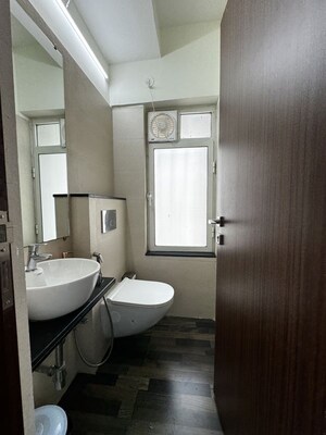 Bathroom in 1 BHK Apartment at Omkar Signet, Malad East – for Rent