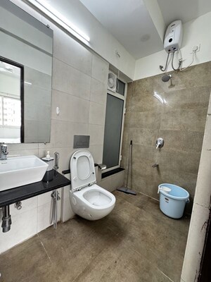 Bathroom in 1 BHK Apartment at Omkar Signet, Malad East – for Rent