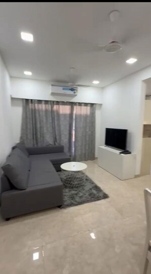 Living Room in 1.5 BHK Apartment at Platinum Apartment, Andheri West – for Sale