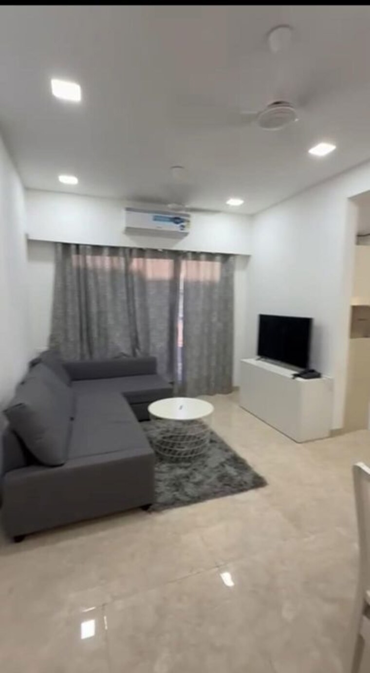 Living Room, platinum-apartment 1.5 Bedroom 675 Sq.Ft. Apartment In Andheri West Mumbai 10626034