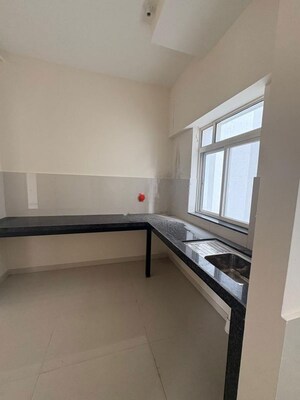 Kitchen in 2 BHK Apartment at Megapolis Serenity, Hinjewadi – for Rent
