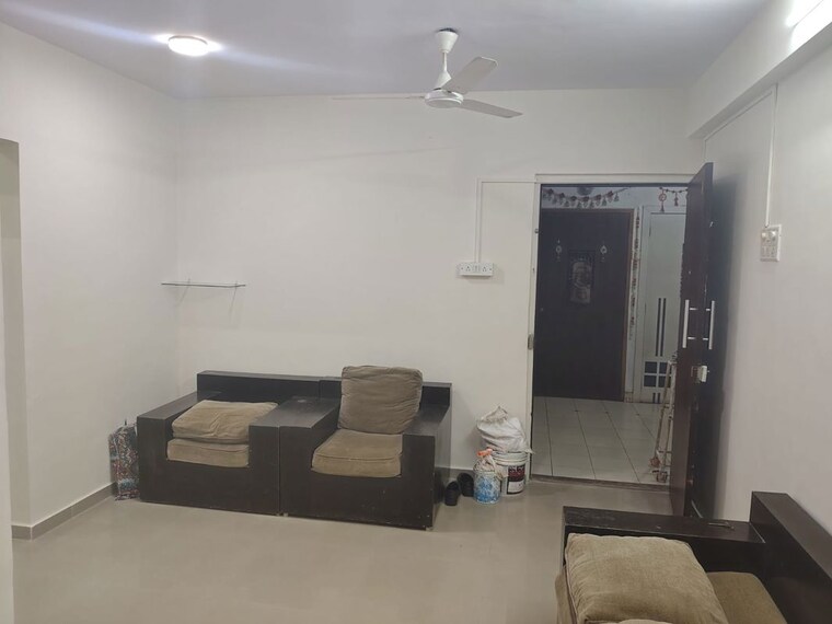 Living Room, group-seven-rushi-heights 3 Bedroom 900 Sq.Ft. Apartment In Goregaon East Mumbai 10626117