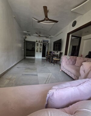 Living Room in 2 BHK Apartment at Borivali West – for Sale