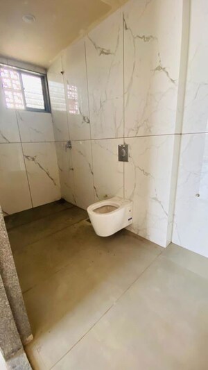 Bathroom in 4 BHK Apartment at Kasper Woods, New Alkapuri – for Sale