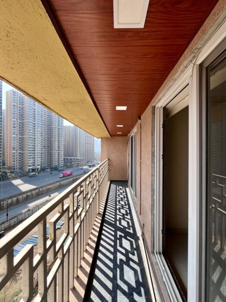 Balcony, paradise-lifespaces-sai-world-city 3 Bedroom 1550 Sq.Ft. Apartment In New Panvel Navi Mumbai 10626883