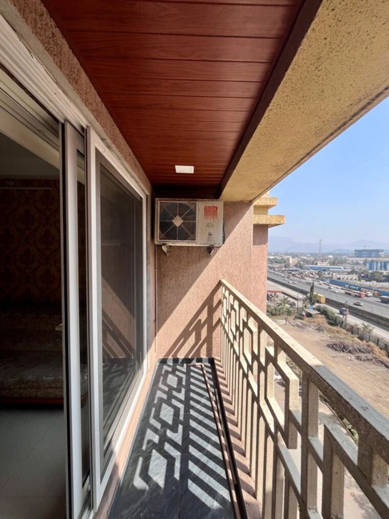 Balcony, paradise-lifespaces-sai-world-city 3 Bedroom 1550 Sq.Ft. Apartment In New Panvel Navi Mumbai 10626883