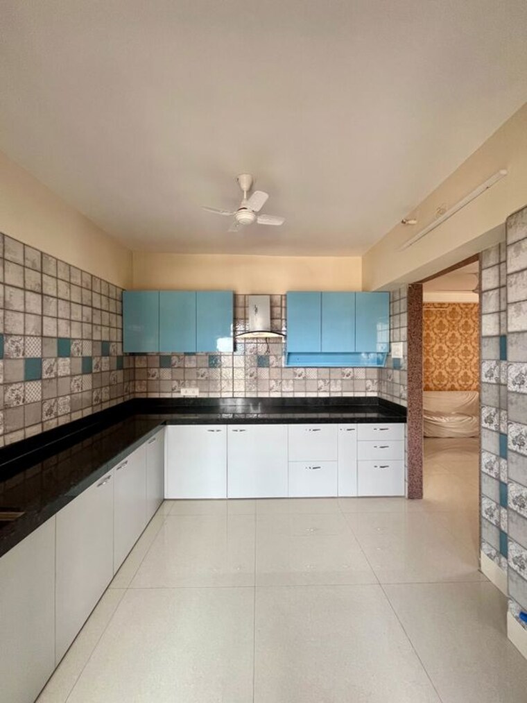 Kitchen, paradise-lifespaces-sai-world-city 3 Bedroom 1550 Sq.Ft. Apartment In New Panvel Navi Mumbai 10626883
