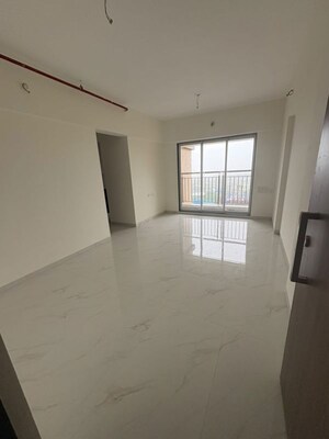 Living Room in 1 BHK Apartment at Pride Larkins Nest, Ghodbunder Road – for Rent