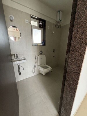 Bathroom in 2 BHK Apartment at Puranik City Reserva, Ghodbunder Road – for Rent