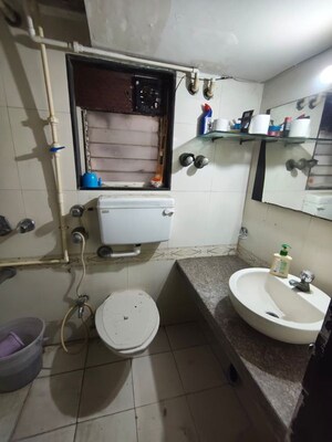 Bathroom in 1 BHK Apartment at Evershine Woods, Mira Road – for Rent
