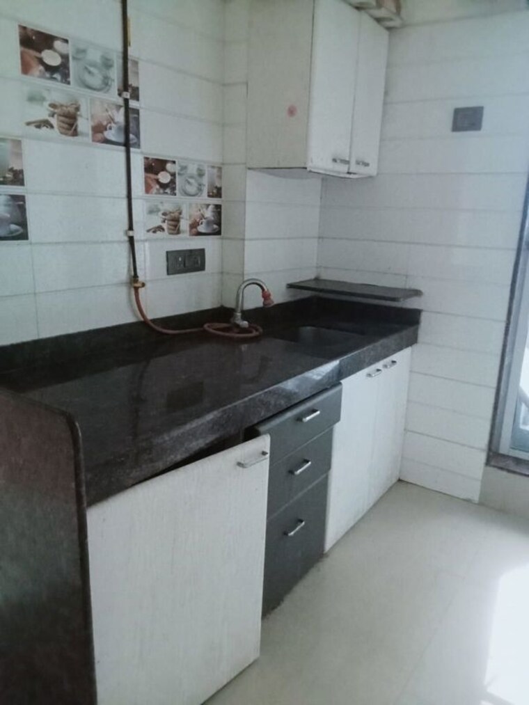 Kitchen, asha-ashok-smruti 1 Bedroom 450 Sq.Ft. Apartment In Vadavali Thane 10627019