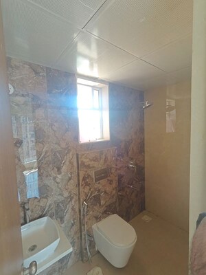 Bathroom in 1 BHK Apartment at Dosti West County Phase 4 Dosti Pine, Balkum Pada – for Rent