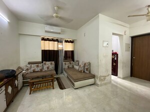 Living Room in 1 BHK Apartment at Lodha Amara, Kolshet Road – for Rent