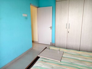Bedroom in 2 BHK Apartment at Powai Cosmopolitan CHS, Powai – for Rent