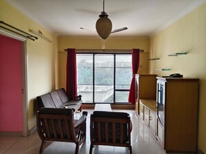 Living Room in 2 BHK Apartment at Powai Cosmopolitan CHS, Powai – for Rent