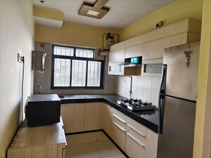 Kitchen in 2 BHK Apartment at Powai Cosmopolitan CHS, Powai – for Rent