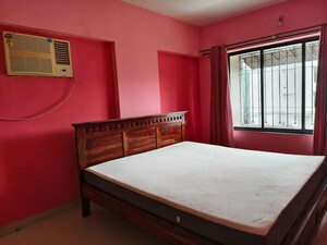 Bedroom in 2 BHK Apartment at Powai Cosmopolitan CHS, Powai – for Rent