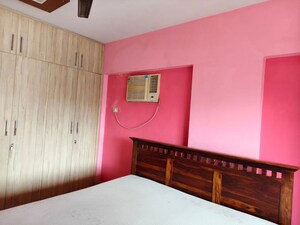 Bedroom in 2 BHK Apartment at Powai Cosmopolitan CHS, Powai – for Rent