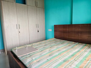 Bedroom in 2 BHK Apartment at Powai Cosmopolitan CHS, Powai – for Rent