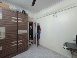 Room in 1 BHK Apartment at Sai Darshan CHS, Kopar Khairane Sector 19 – for Rent
