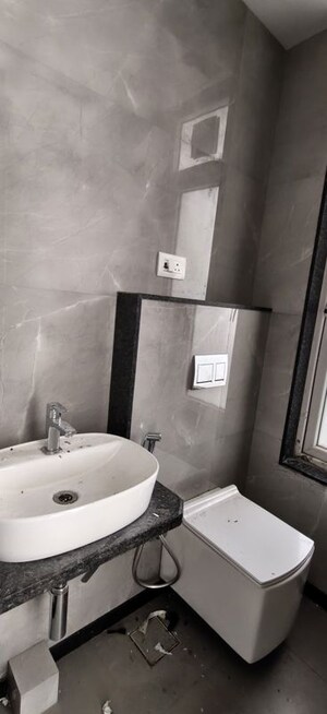 Bathroom in 2 BHK Apartment at Dimples 73 East, Kandivali West – for Rent